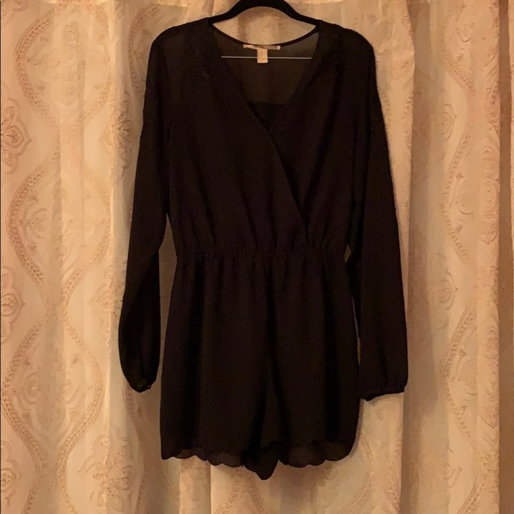 Cute black jumper for a night out w/ floral detail
